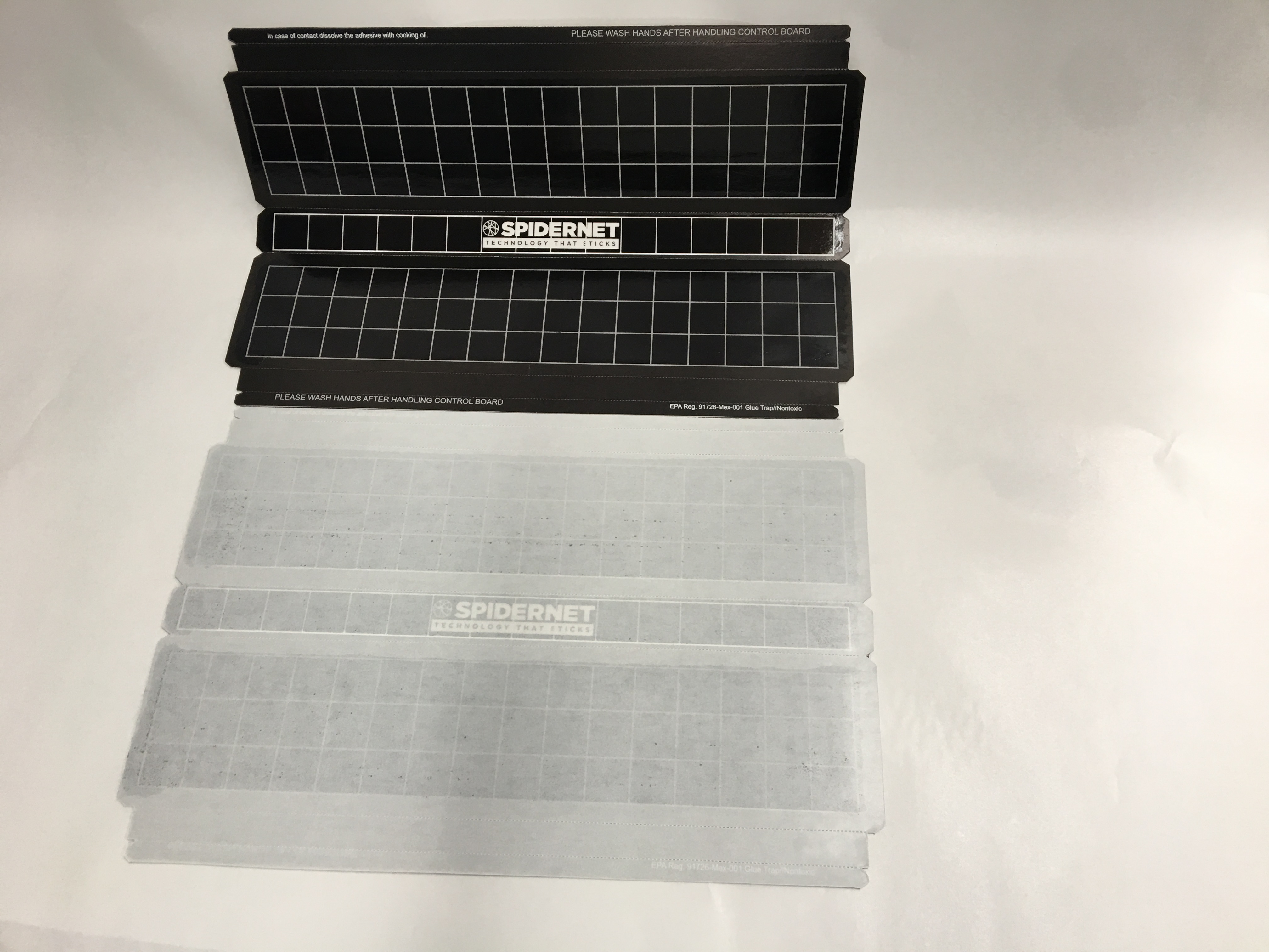 Black Spidernet flying insect glue boards with monitoring grids