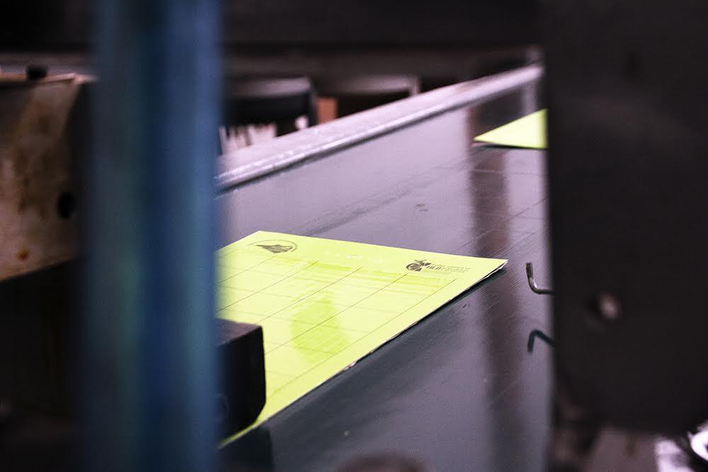 Yellow adhesive board on production equipment
