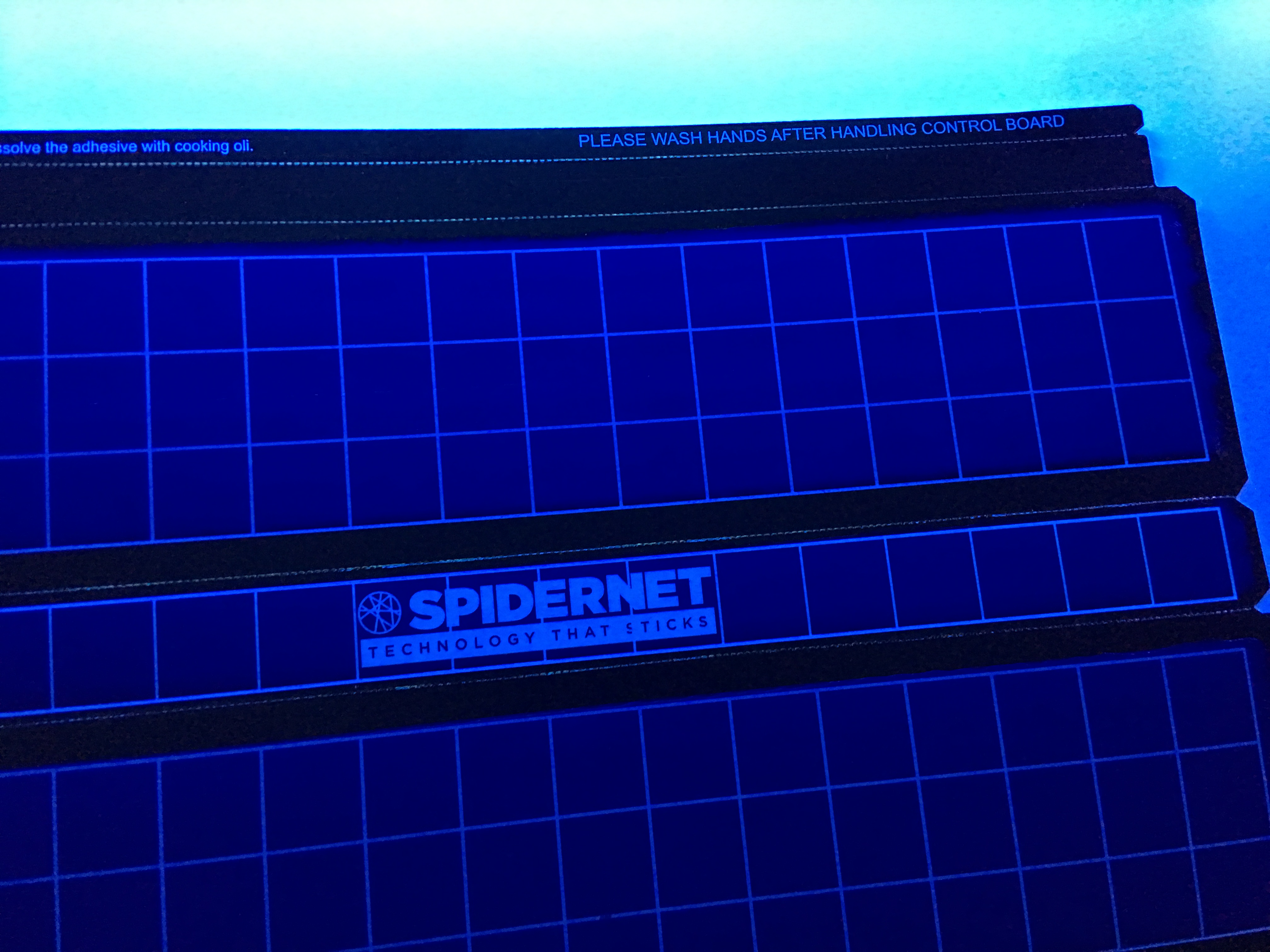 Spidernet flying insect glue board under UV light