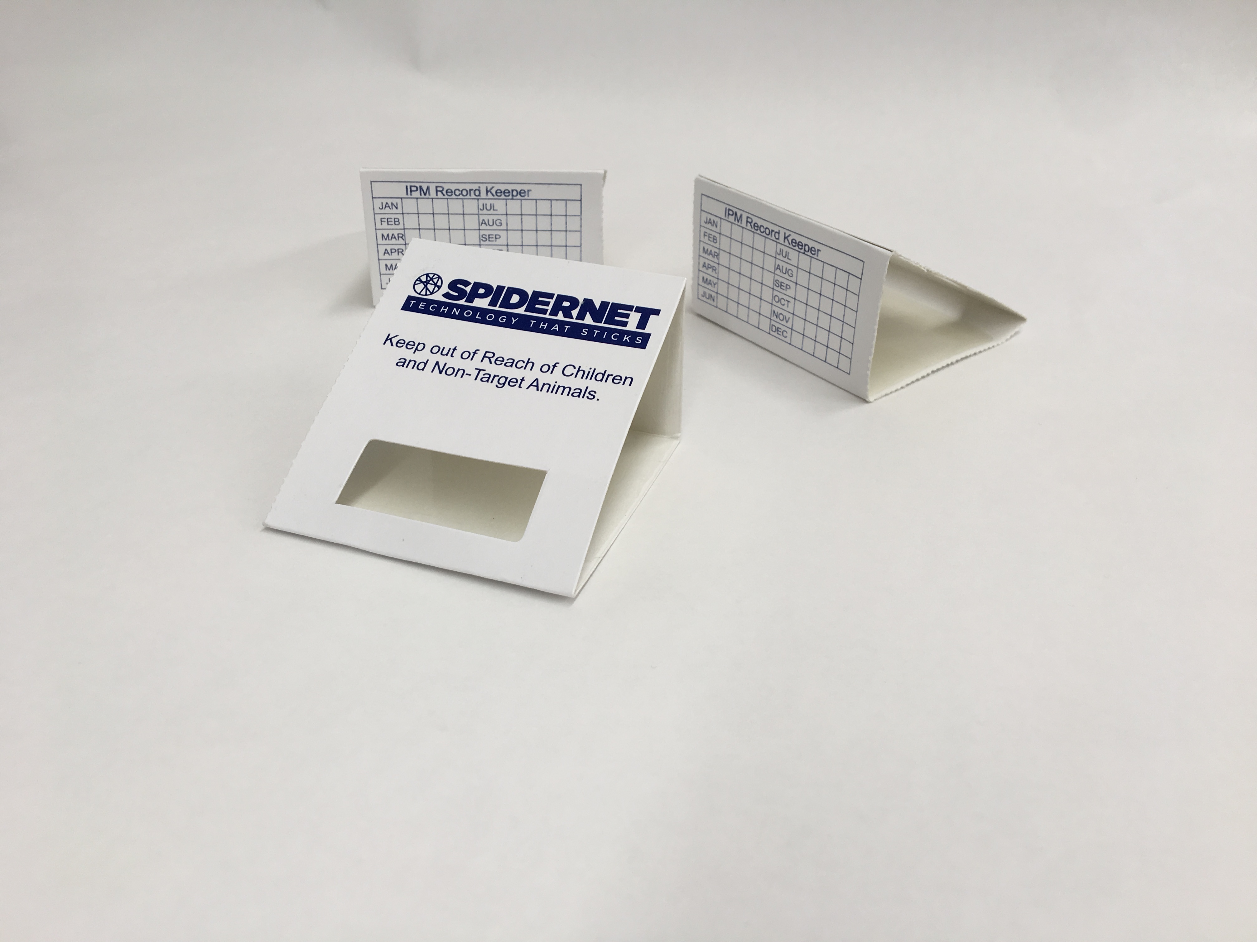 Spidernet branded adhesive traps showing folded product formats